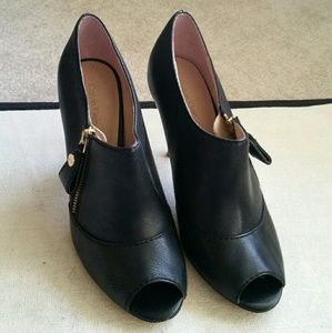 CK open-toe black booties